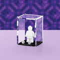 Acrylic display case with custom printed pixelated portal design that fits one minifigure