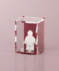 burgundy colored acrylic display case for a single LEGO minifigure
