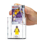 LEGO minifigure card case being shown with a collectible sports card being inserted into the back of the case