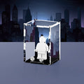 Acrylic display case with custom printed night city design that fits one minifigure
