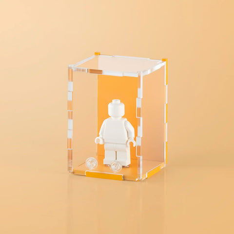 orange pastel colored acrylic display case for a single LEGO minifigure