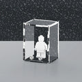 Acrylic display case with glitter stars design that fits one minifigure