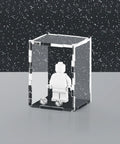 Acrylic display case with glitter stars design that fits one minifigure