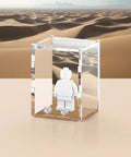 Acrylic display case with sand dune graphic background that fits one LEGO minifigure